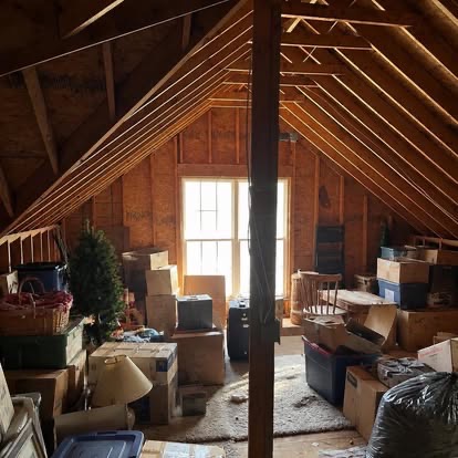 Attic full of clutter before junk removal in the Charlotte area