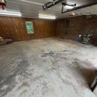 Empty swept garage after Mighty Dump cleanout